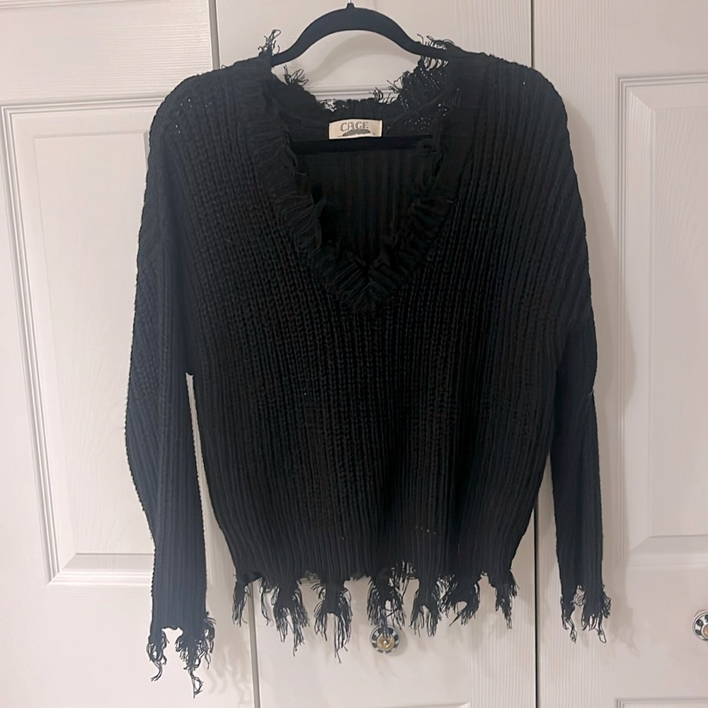 Cage oversized v-neck distressed knit sweater